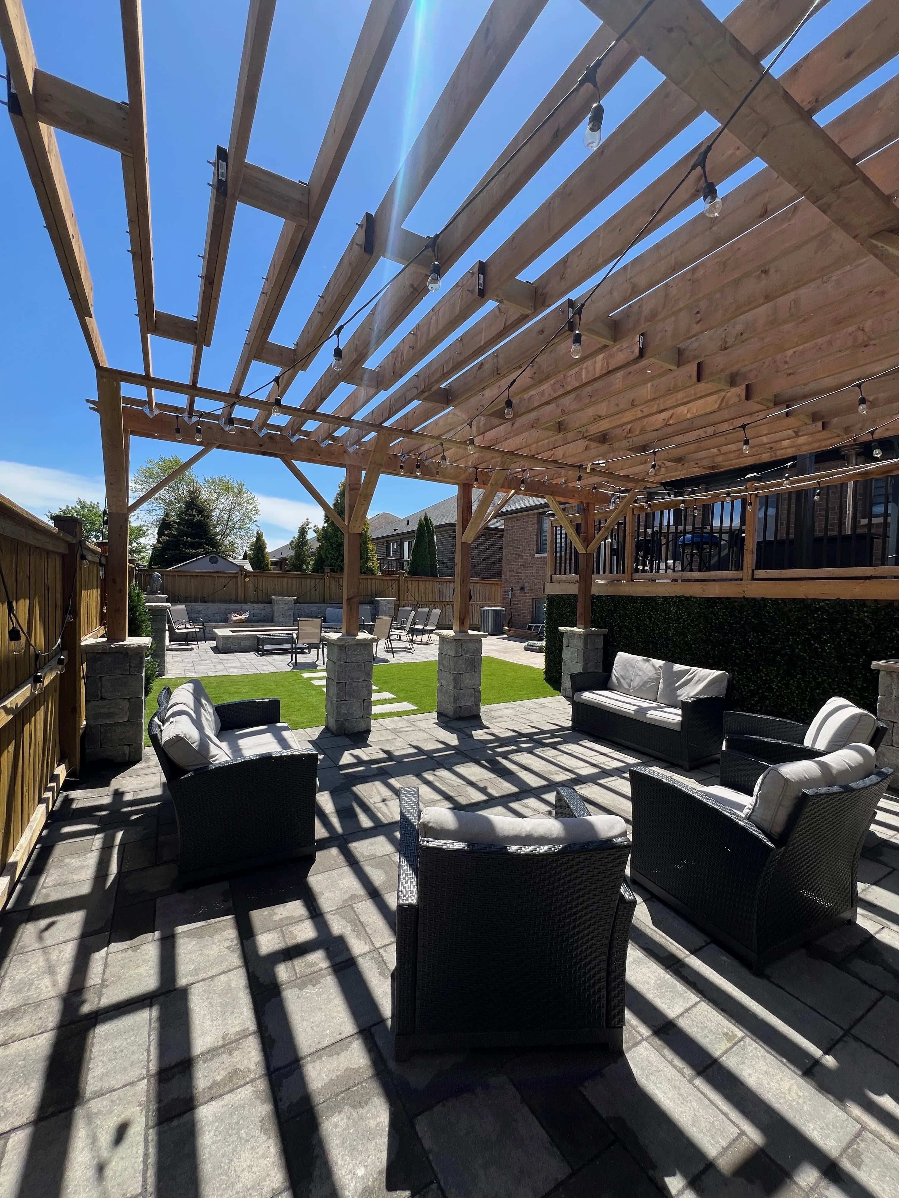 How to Design a Low-Maintenance Backyard Oasis in Tecumseh
